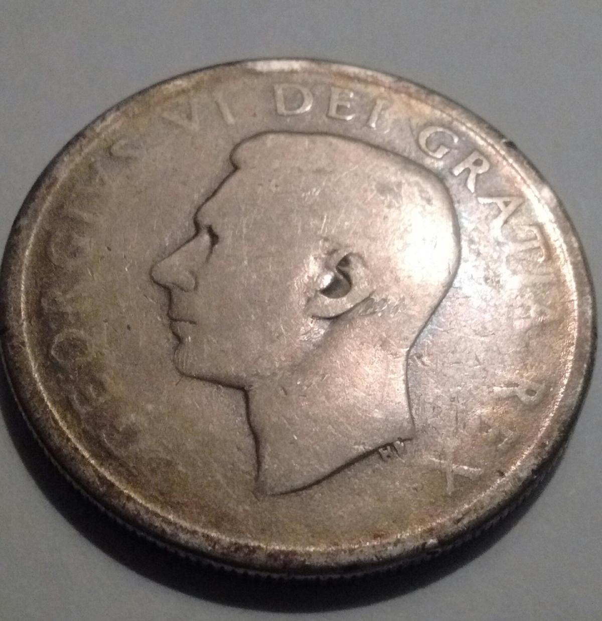 1952-Canada-Silver-Dollar-What-Could-Have-Caused-This?